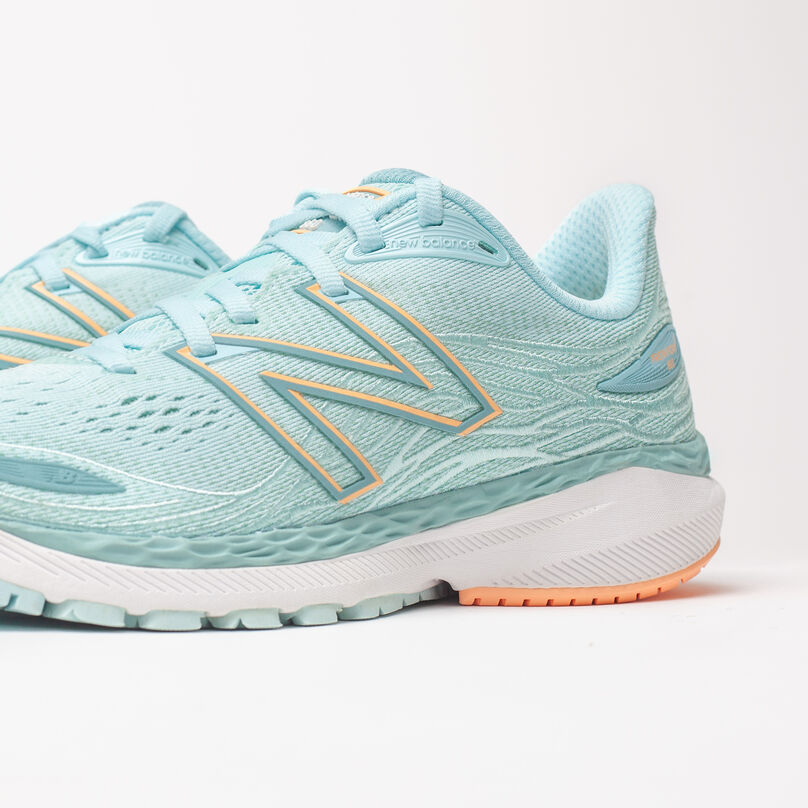 Zoomed in, side profile of light blue Fresh Foam 860v12 with front upper cropped