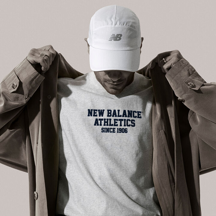Close up of man wearing NB apparel and accessories 